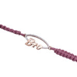 Bro Script Rakhi in Rose Gold on Purple Cord Bro Script Rakhi in Rose Gold on Purple Cord