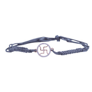 Swastik Rakhi with Accents in Rose Gold Finish on Grey Cord Swastik Rakhi with Accents in Rose Gold Finish on Grey Cord